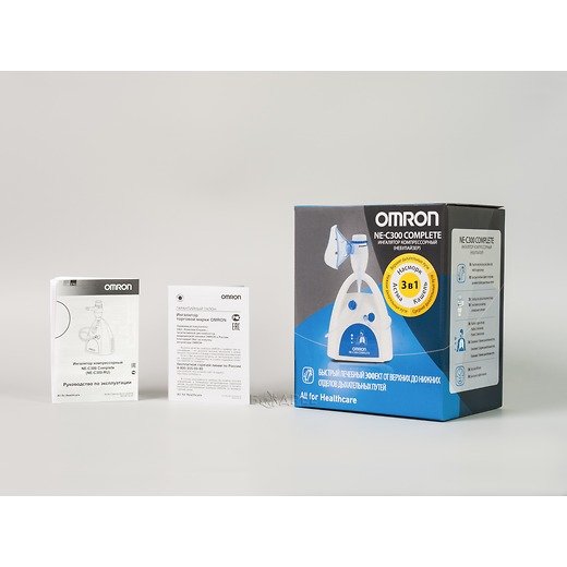 Коробка и документация к компрессорному небулайзеру Omron C 300